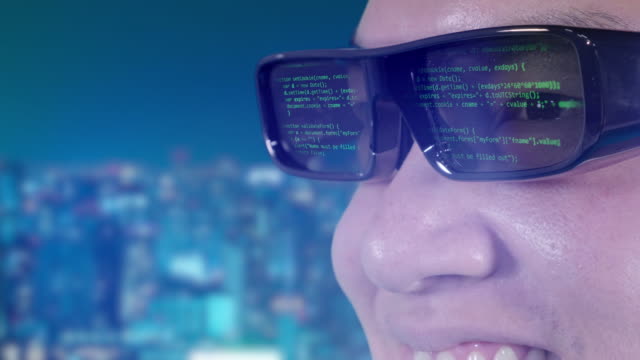 Man-and-smart-glasses-gadget-VR-computer-coding-screen,-IoT-technology-online-AI-futuristic-background,-future-lifestyle.