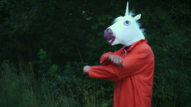 4K-Halloween-Man-with-Unicorn-Horse-Mask-Dancing