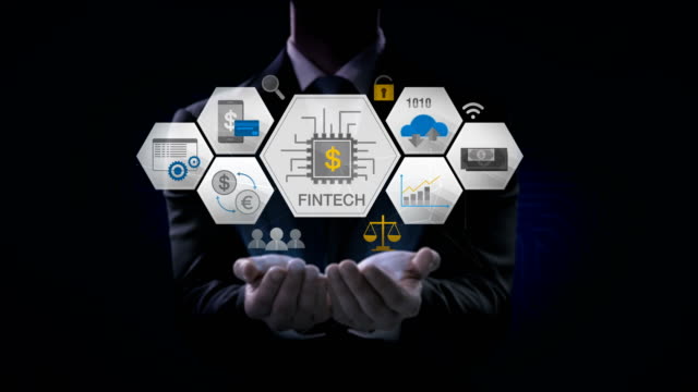 Businessman-opens-two-palms,-Fin-tech-icon-and-various-graph.-Futuristic-financial-technology.-4k-movie.-version-2.