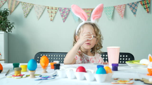 Little-Girl-Eating-Peeled-Easter-Egg