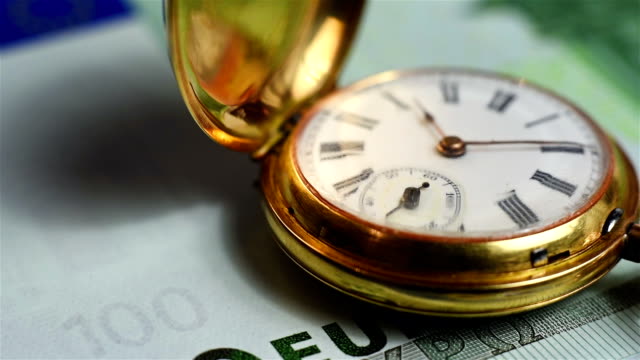 pocket-watch-and-euro-banknote