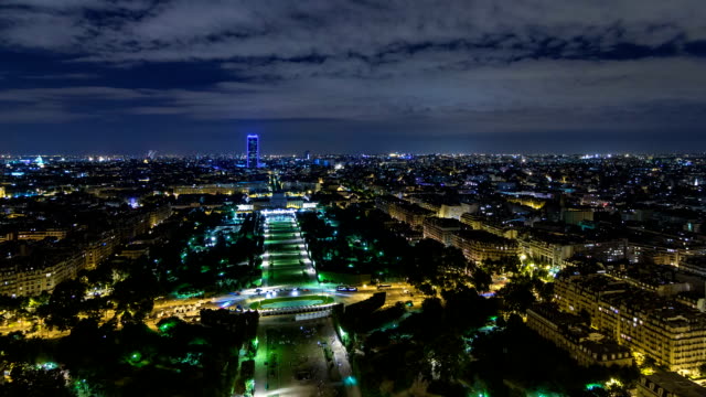 Aerial-Night-timelapse-view-of-Paris-City-and-Field-of-Mars-shot-on-the-top-of-Eiffel-Tower