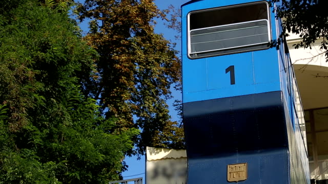 Two-moving-cabins-of-Zagreb-funicular,-public-transportation,-famous-attraction