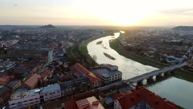 Aerial-footage-of-Mukachevo-city-center---top-view-at-sunset-time