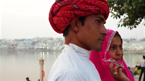 Pan-to-closeup-beautiful-Indian-bride-and-handsome-husband--in-Pushkar,-India