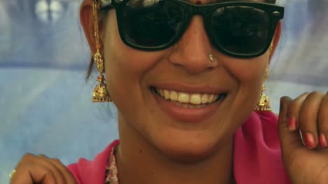 Cool-Indian-chick-with-sunglasses-and-pink-sari-hanging-around-with-her-man-in-red-turban