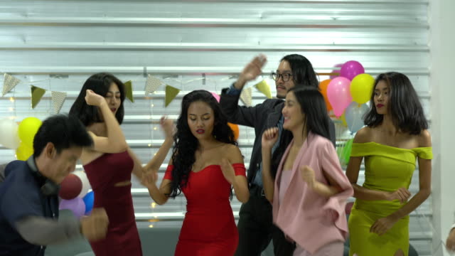 People-enjoy-and-funny-dancing-celebration-happy-birthday-with-friends-together-in-night-club.-Concept-of-lady-night,-birthday,-happy-new-year-and-christmas.-4k-resolution.