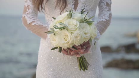 Bride-holding-a-wedding-bouquet