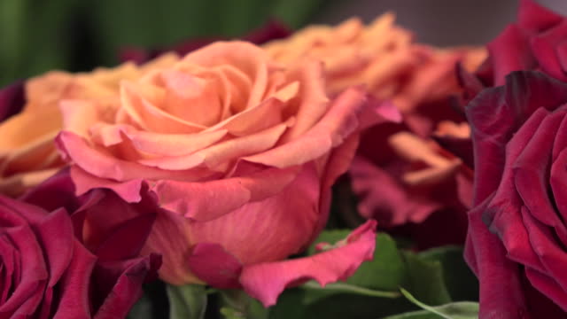 a-florist-manufactures-a-bouquet-of-roses