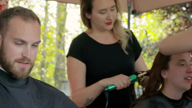 Bride-and-Groom-Couple-Getting-Hair-Done-Together-Before-Wedding