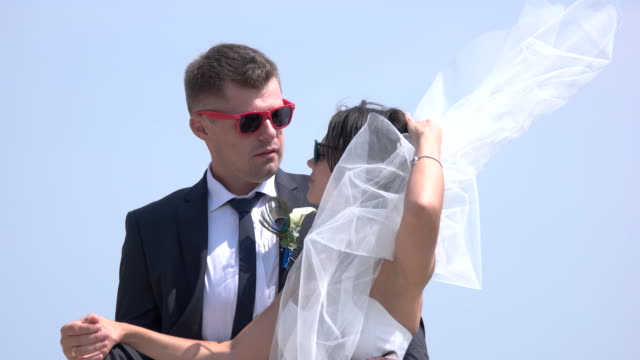 Wedding-couple-in-sunglasses.