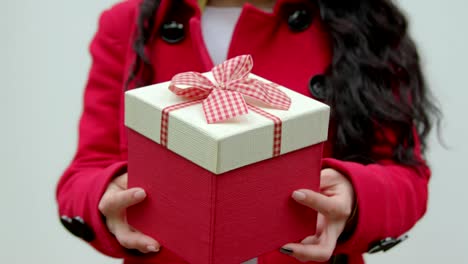 Gift-box-in-woman-hands
