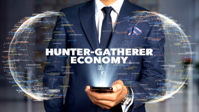Businessman-Hologram-Concept-Economics---Hunter-gatherer-economy