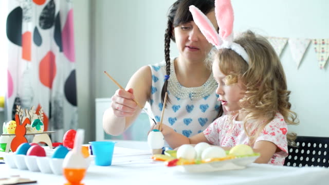 Woman-and-her-Daughter-Preparing-for-Easter