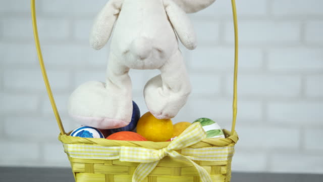 Toy-bunny-with-goat-Easter-eggs.