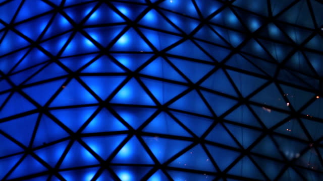 Blue-illumination-on-glass,-closeup-of-decoration-details.-Holiday-atmosphere