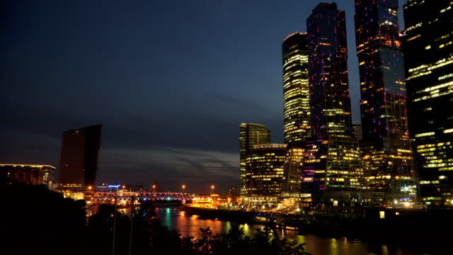Business-center-on-the-river-bank-at-night