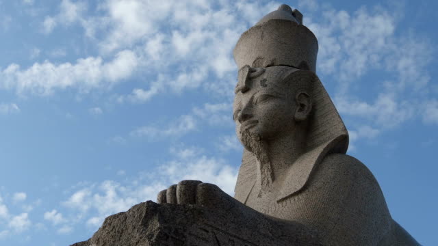 TIME-LAPSE:-Egyptian-stone-sphinx-and-a-clouds---St.-Petersburg,-Russia