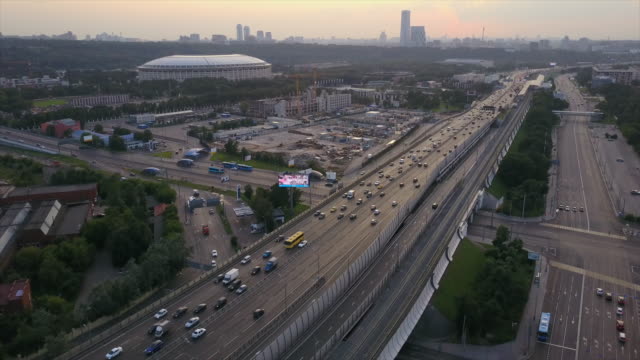 russia-sunset-sky-moscow-traffic-ring-luzniki-stadium-aerial-panorama-4k