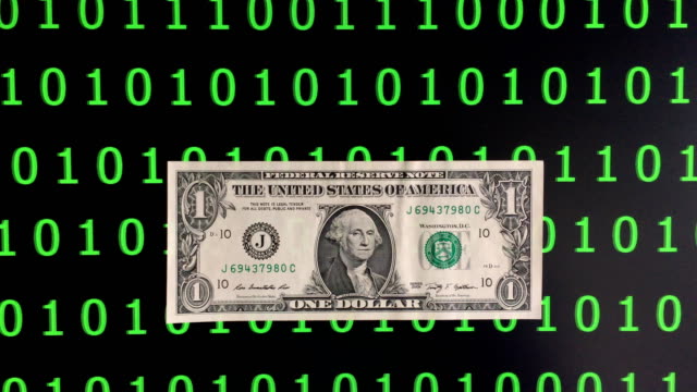 us-dollar-banknote-among-binary-code-background