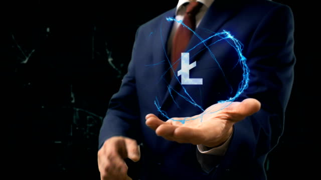 Businessman-shows-concept-hologram-Sign-LTC-on-his-hand