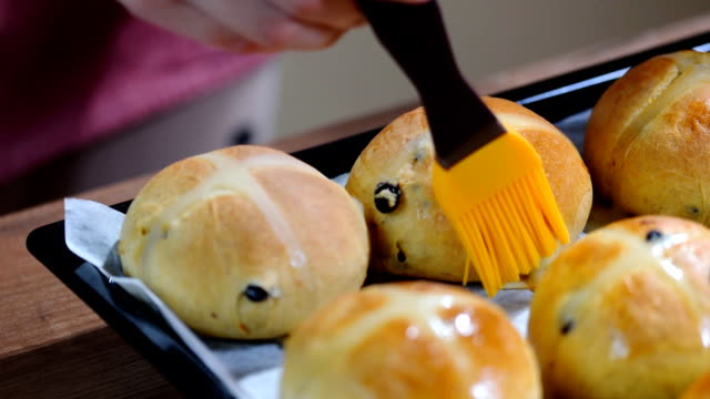 Traditional-Easter-treats-cross-buns-with-raisins.-Homemade-Hot-Cross-Buns-Ready-for-Easter