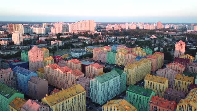 Colorful-buildings-of-a-residential-district,-aerial-shooting-from-a-drone-on-Comfort-Town.-Kiev,-Ukraine