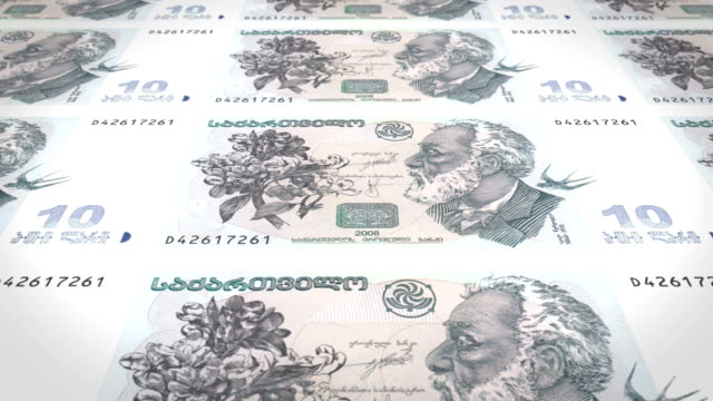 Billetes-de-diez-Georgian-lari-de-la-República-de-Georgia,-dinero-en-efectivo,-lazo