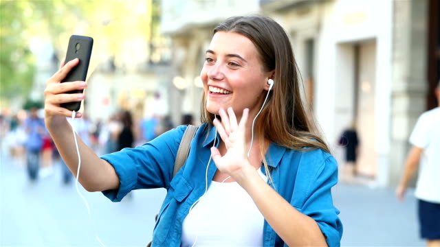 Girl-having-a-video-call-in-the-street