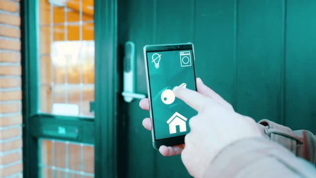 Smart-home-app-on-mobile-phone-opens-door-lock-wirelessly