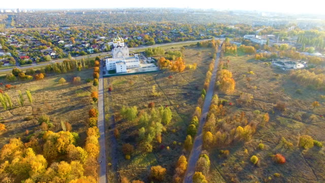 Aerial-view-to-Orthodox-church-in-park-in-Kharkiv,-Ukraine