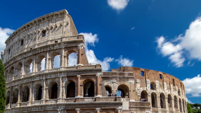 The-Colosseum-or-Coliseum-timelapse-hyperlapse,-also-known-as-the-Flavian-Amphitheatre-in-Rome,-Italy