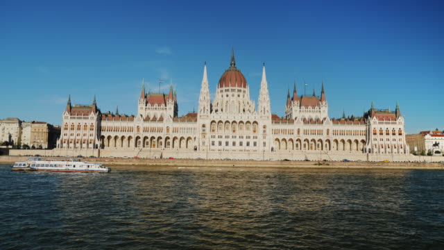 Parliament-building-of-Hungary-at-sunset.-River-cruise-on-the-Danube