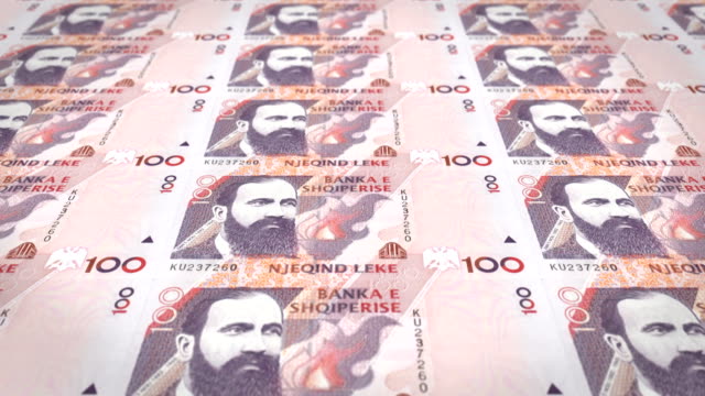 Banknoten-der-hundert-albanischer-Lek-von-Albany-Rollen,-Bargeld,-Schleife