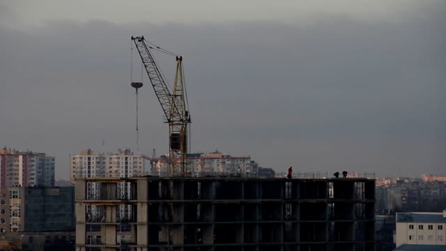 Construction-of-high-rise-building,-cityscape.Time-lapse-video