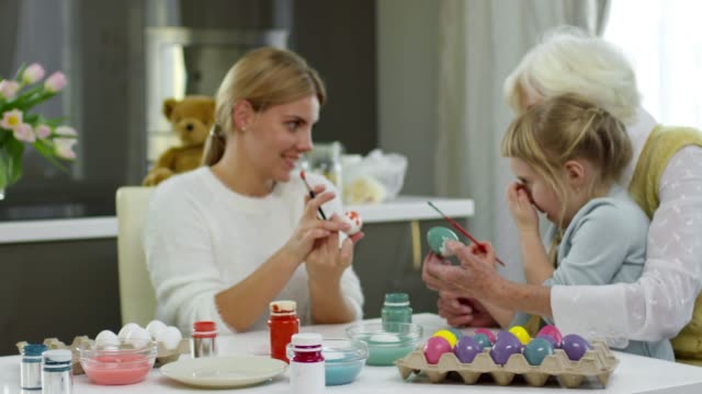 Women-Decorating-Easter-Eggs-for-Holiday