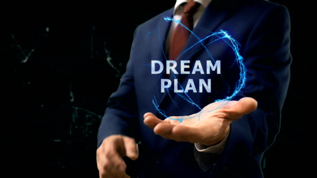 Businessman-shows-concept-hologram-Dream-plan-on-his-hand