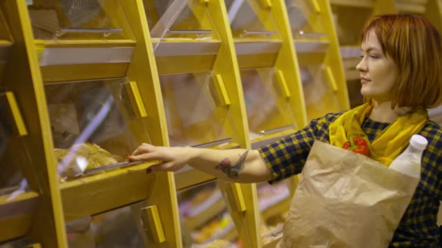 Paraplegic-Woman-Buying-Bread-in-Supermarket