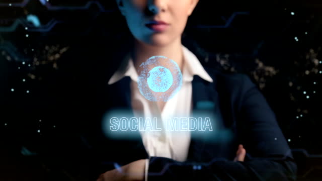 Social-media-logo.-Futuristic-business-woman,-uses-a-hologram-of-the-world-ball.
