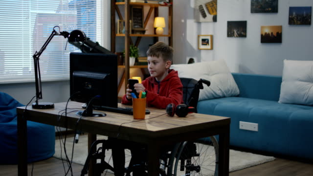 Disable-boy-having-video-call