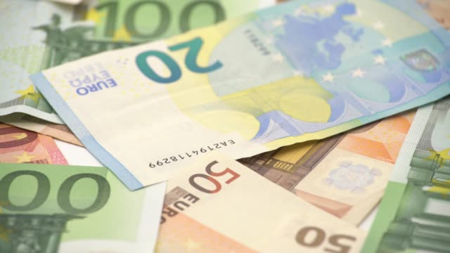 4K-Dolly-sliding-shot-euros-bills-of-different-values.-Euro-cash-money