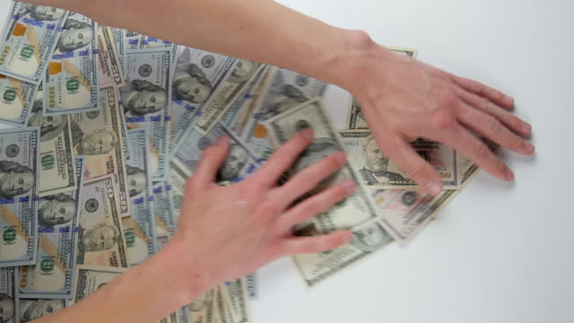 Close-up-of-a-hand-take-out-dollar-bills.-The-concept-of-winning-money