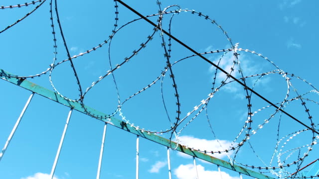 Fence-with-barbed-wire.-Fencing-of-the-territory.-Prison-enterprise.-Prohibition-of-visiting-the-territory.-Security,-unauthorized-entry-is-prohibited