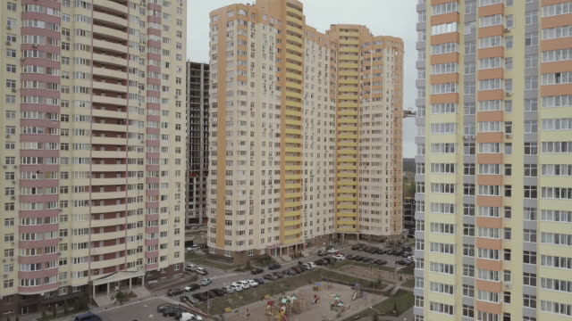 Aerial-view.-A-complex-of-new-high-rise-apartment-buildings-in-the-city.-Camera-goes-up