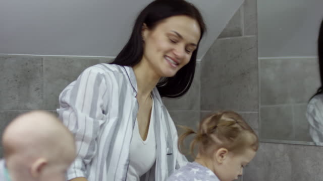 Female-Couple-with-Children-in-Bathroom