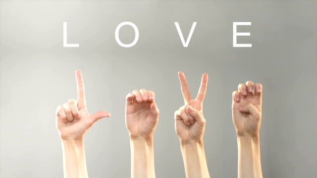 Love-word-written-and-shown-with-hands-in-deaf-asl-language,-expressing-feelings
