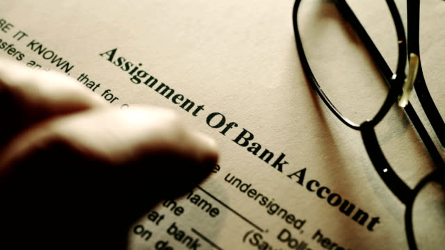 Finger-tapping-on-assignment-of-bank-account