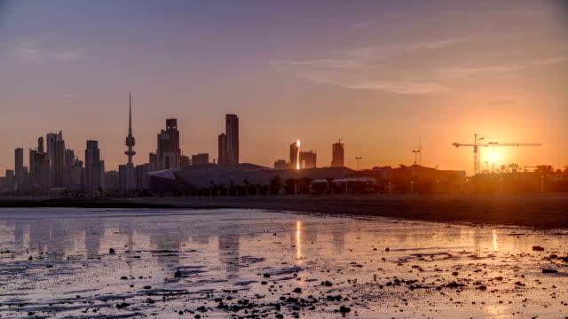 Seaside-skyline-of-Kuwait-city-sunrise-timelapse