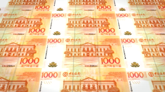 Banknotes-of-one-thousand-macanese-patacas-of-Macau-rolling,-cash-money,-loop