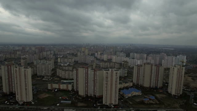 Aerial-drone-footage-of-gray-dystopian-urban-area-with-identical-houses